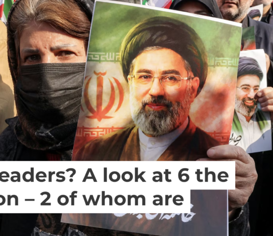 A woman poses with a picture of Iran’s new supreme leader, Ayatollah Mojtaba Khamenei, in central Tehran on March 9, 2026. Atta Kenare/AFP via Getty Images